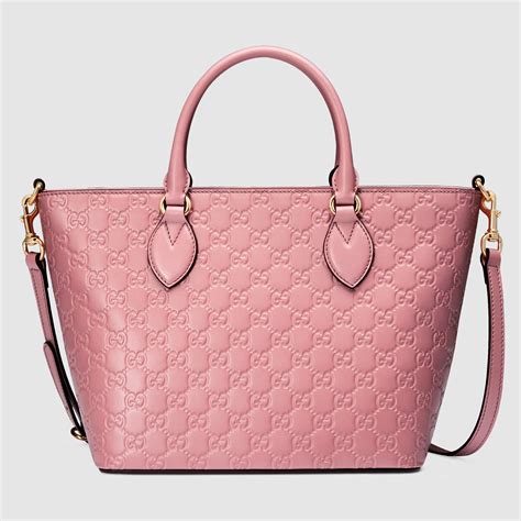 women pink gucci bag